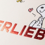Buchcover und Innenansicht für das Buch: Peanuts Geschenkbuch: Verliebt!