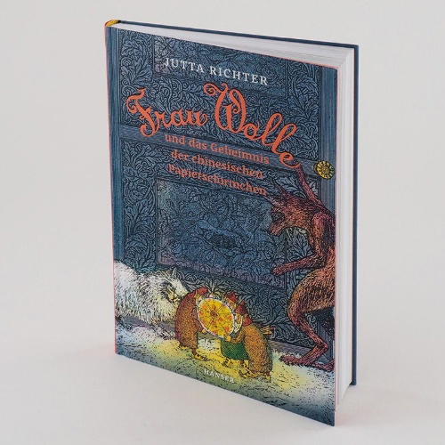 Buchcover und Innenansicht für das Buch: Frau Wolle und das Geheimnis der chinesischen Papierschirmchen