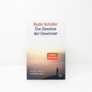Buchcover und Innenansicht für das Buch: Die Gesetze der Gewinner