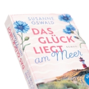 Buchcover und Innenansicht für das Buch: Das Glück liegt am Meer