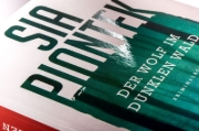 Buchcover und Innenansicht für das Buch: Der Wolf im dunklen Wald