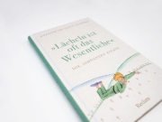 Buchcover und Innenansicht für das Buch: "Lächeln ist oft das Wesentliche". Die schönsten Zitate