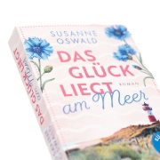 Buchcover und Innenansicht für das Buch: Das Glück liegt am Meer