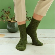 Buchcover und Innenansicht für das Buch: Aktion: Grüne Socke! - Das Strickbuch