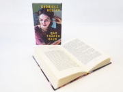 Buchcover und Innenansicht für das Buch: Das Tränenhaus. Roman