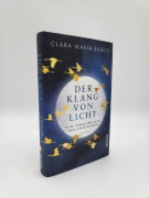 Buchcover und Innenansicht für das Buch: Der Klang von Licht