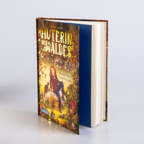 Buchcover und Innenansicht für das Buch: Hüterin des Waldes 3: Theater mit Familie Igel