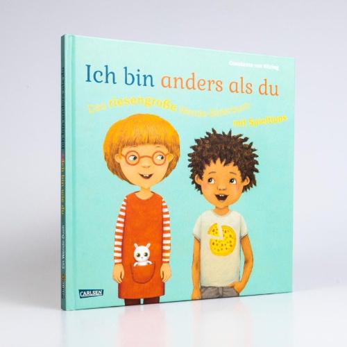 Buchcover und Innenansicht für das Buch: Ich bin anders als du - Ich bin wie du: Das riesengroße Wende-Bilderbuch mit Spieltipps