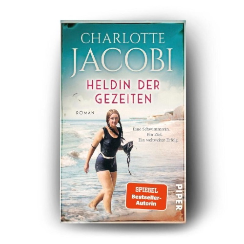 Buchcover und Innenansicht für das Buch: Heldin der Gezeiten - Eine Schwimmerin. Ein Ziel. Ein weltweiter Erfolg.