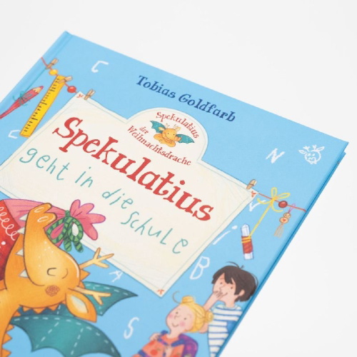Buchcover und Innenansicht für das Buch: Spekulatius, der Weihnachtsdrache. Spekulatius geht in die Schule
